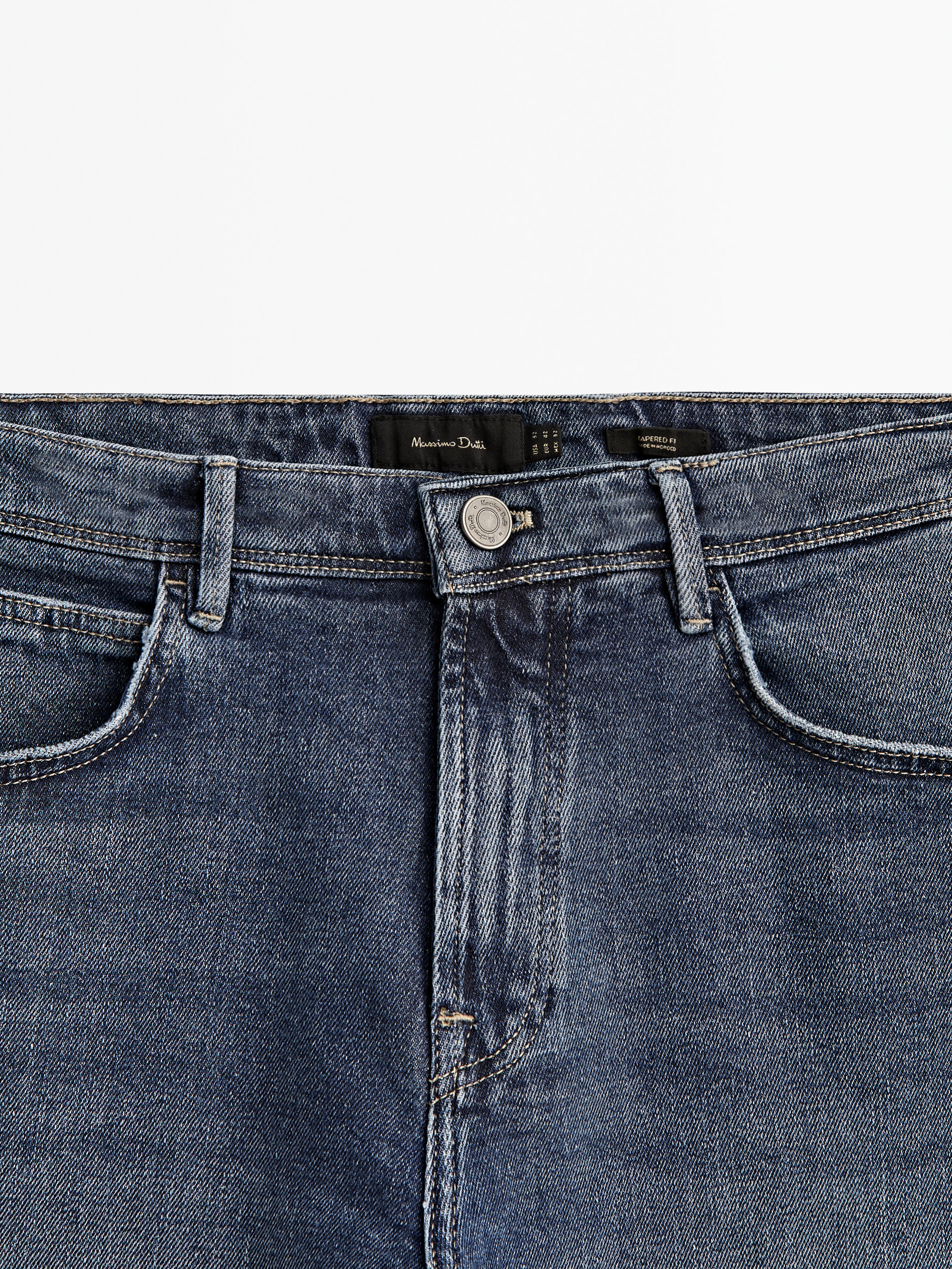 Calça jeans estonada com modelagem afunilada - INDIGO