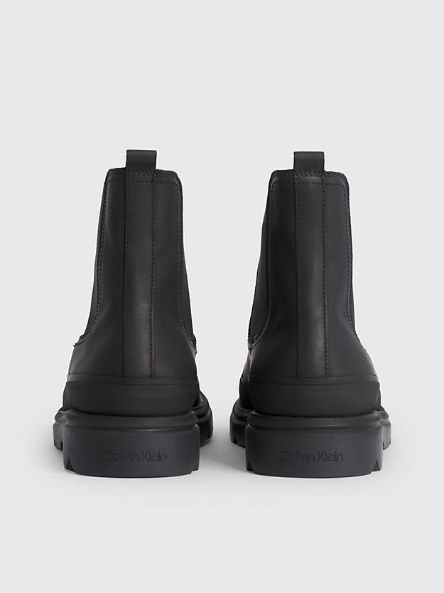 botas de couro até o tornozelo