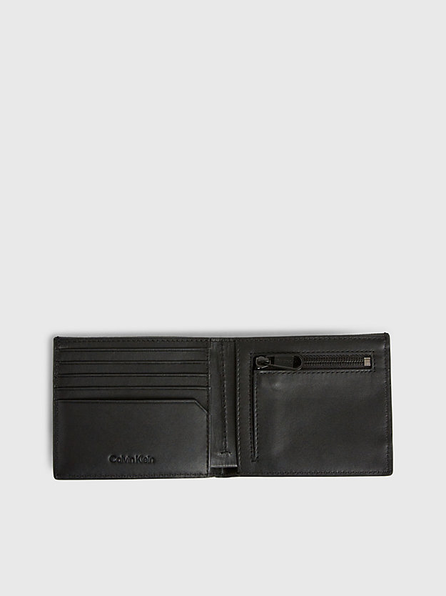 Carteira porta-moedas em couro com bloqueio RFID e logotipo.