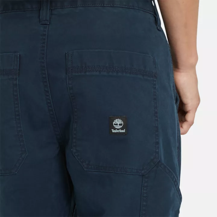 Pantalon charpentier stretch en toile lavée pour homme en bleu foncé