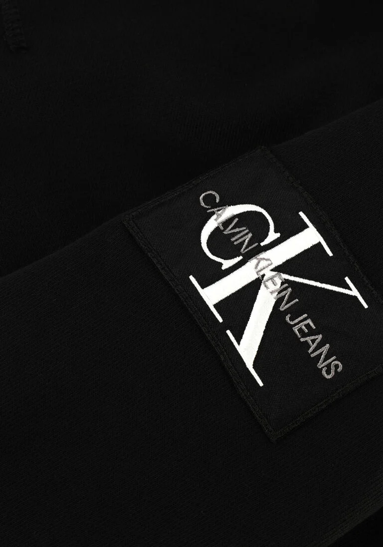 CALVIN KLEIN zwarte calvin klein sweater monogram sleeve badge cn