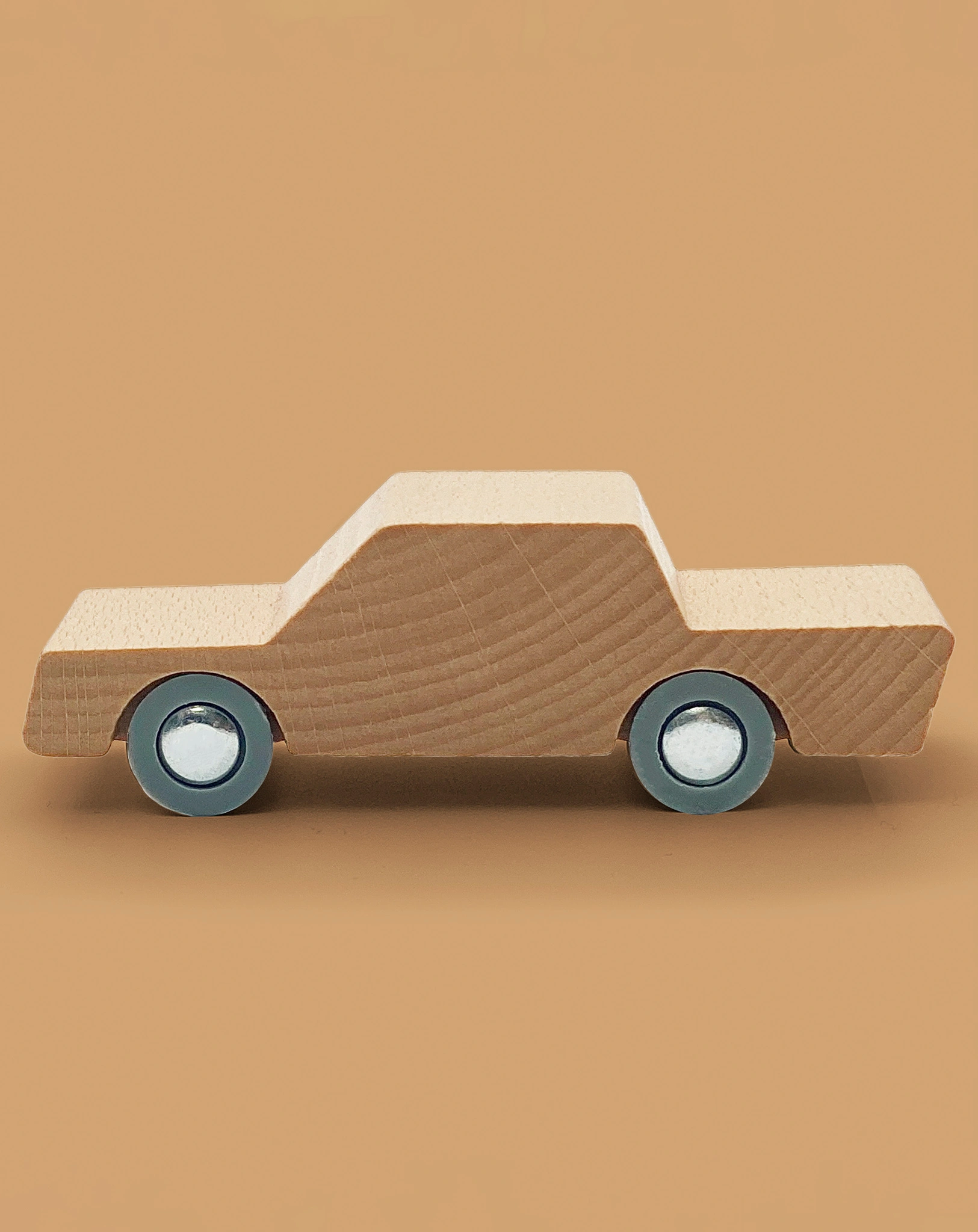 Spielzeugauto WOODY aus Holz in natur
