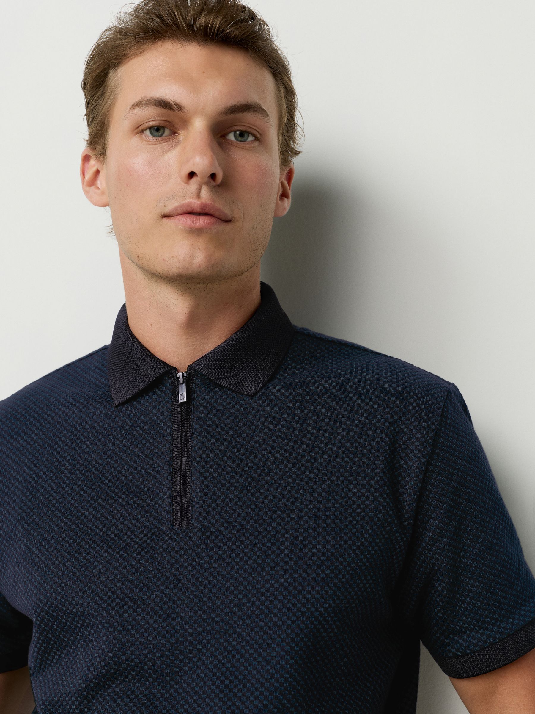 Blauwgroen - Modieus poloshirt met kwartrits