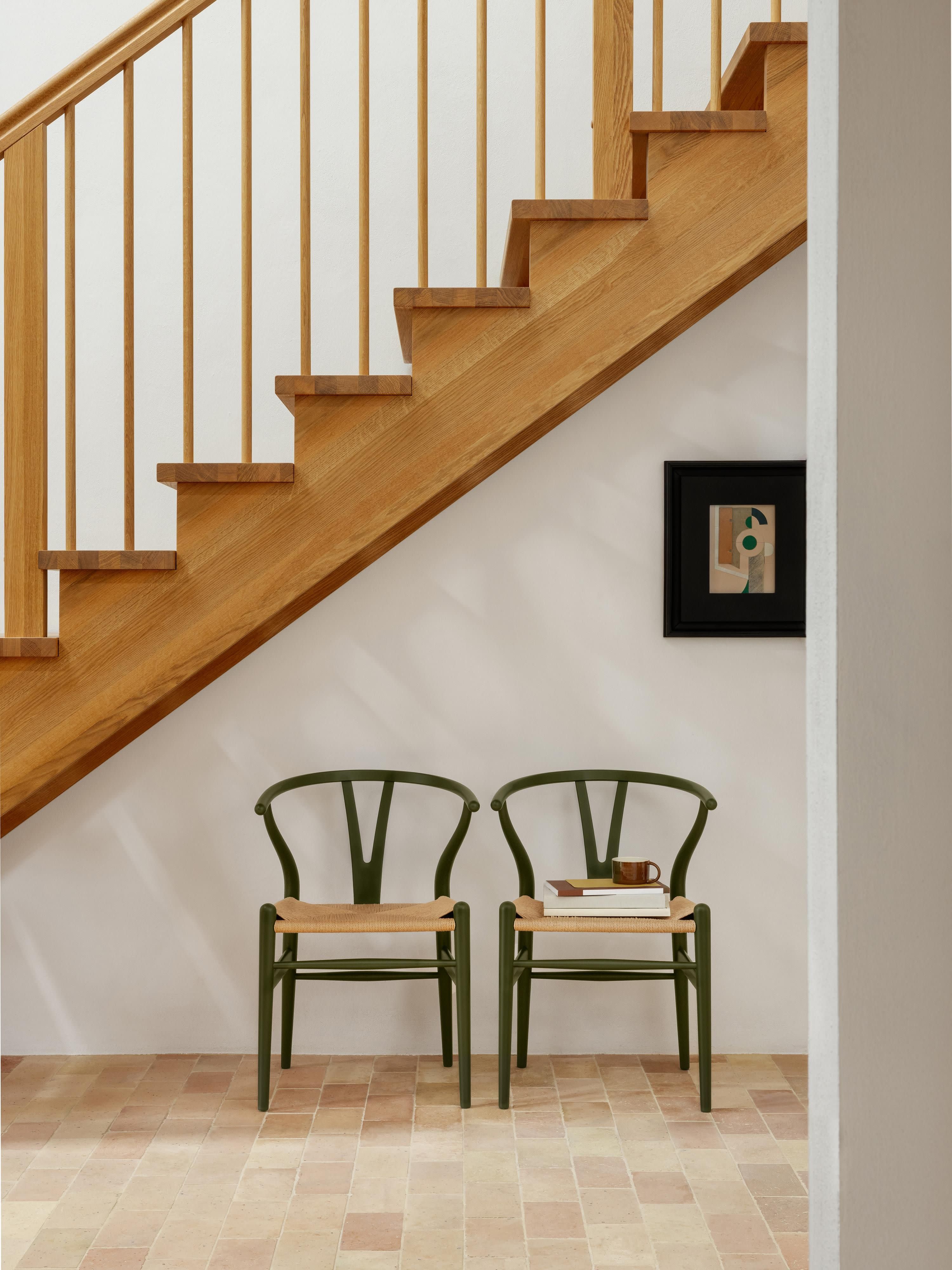 Houten stoel CH24 Wishbone Chair met handgevlochten zitvlak