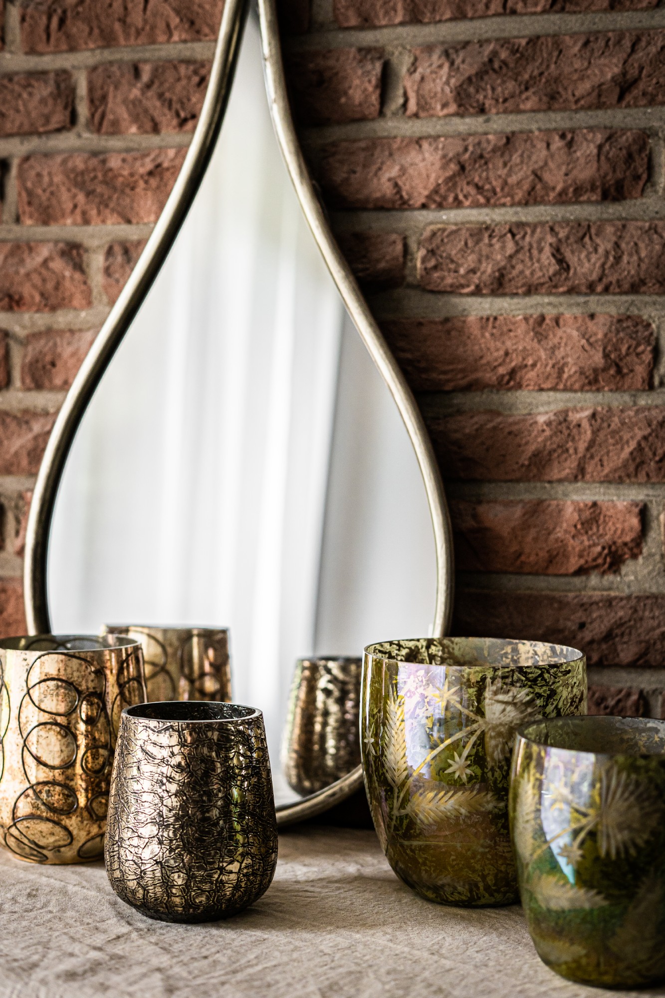Glas-Windlicht 'Serpent', gold, Ø 11 cm, H 15 cm von fischer's lagerhaus