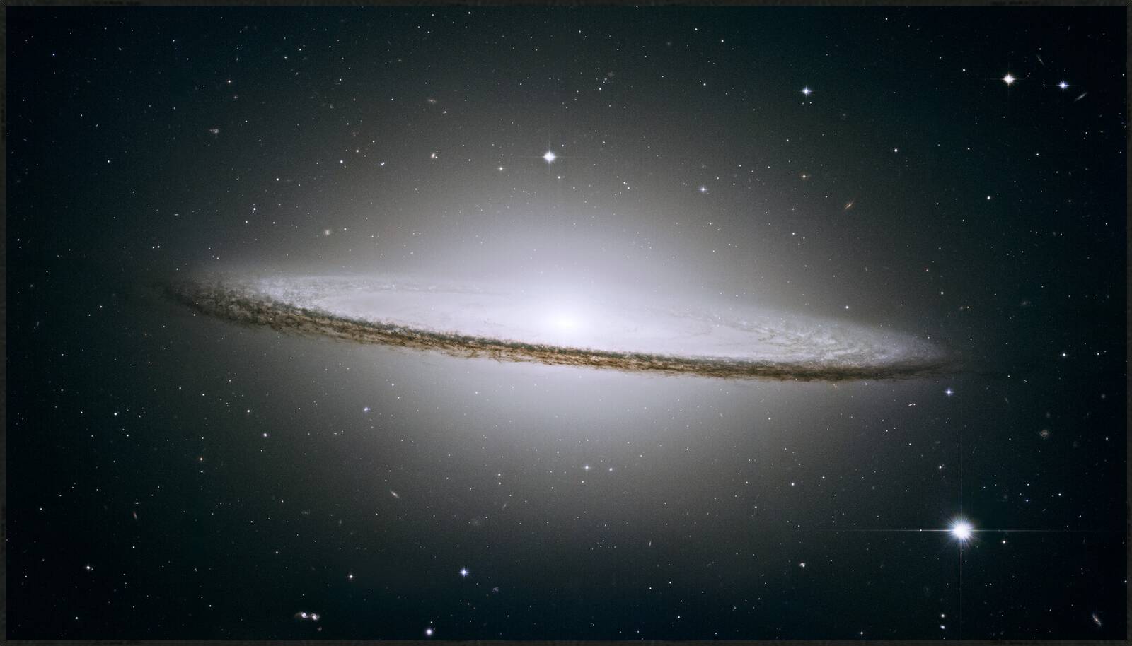 Sombrero Galaxy (NASA & the Hubble Heritage Team/STScl/AURA)  by Hubble Telescope - Open Edition.