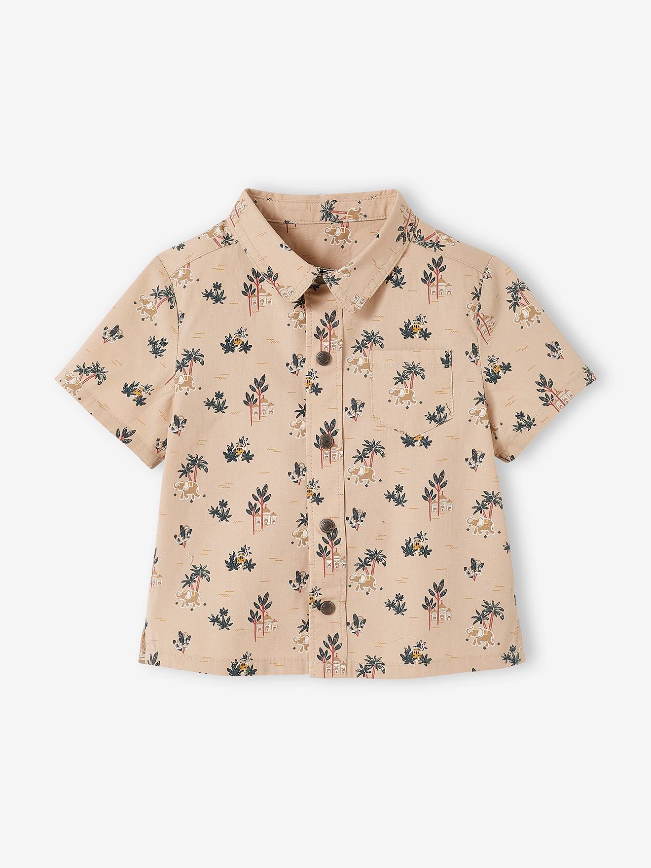 Conjunto de camiseta e shorts bege para bebê com estampa.