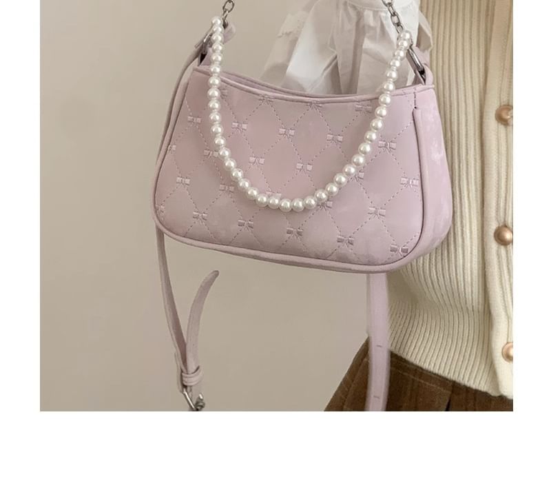 Letheroni - Schoudertas met imitatieparelketting