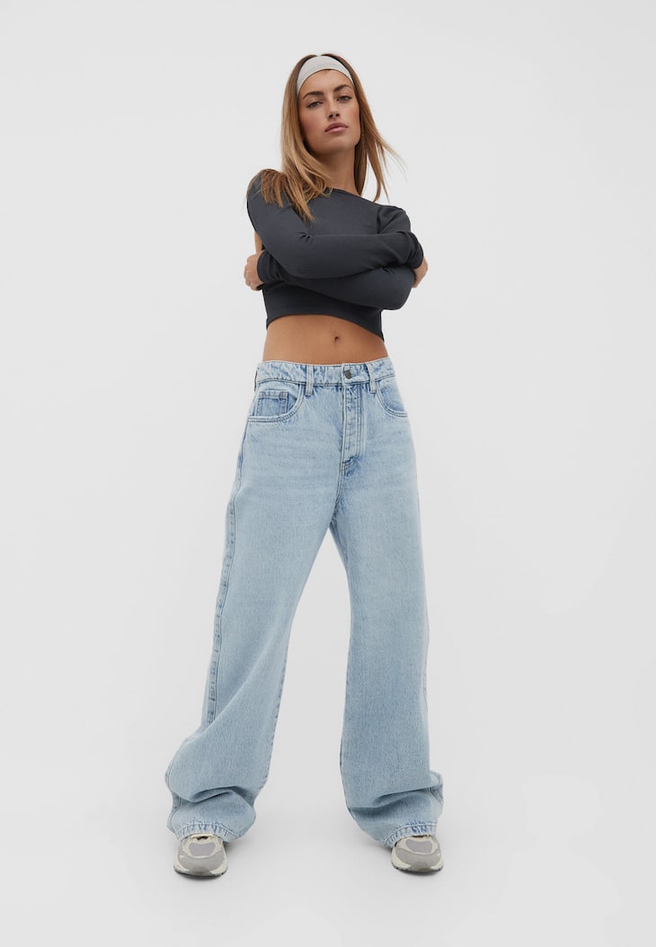 calças jeans de perna larga