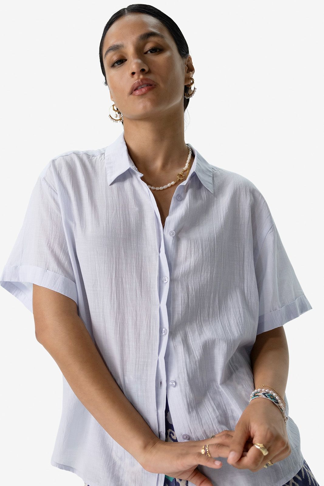 Lichtblauwe blouse met korte mouwen
