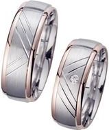 Trouwringen rood en witgoud met Diamant breedte 7 mm