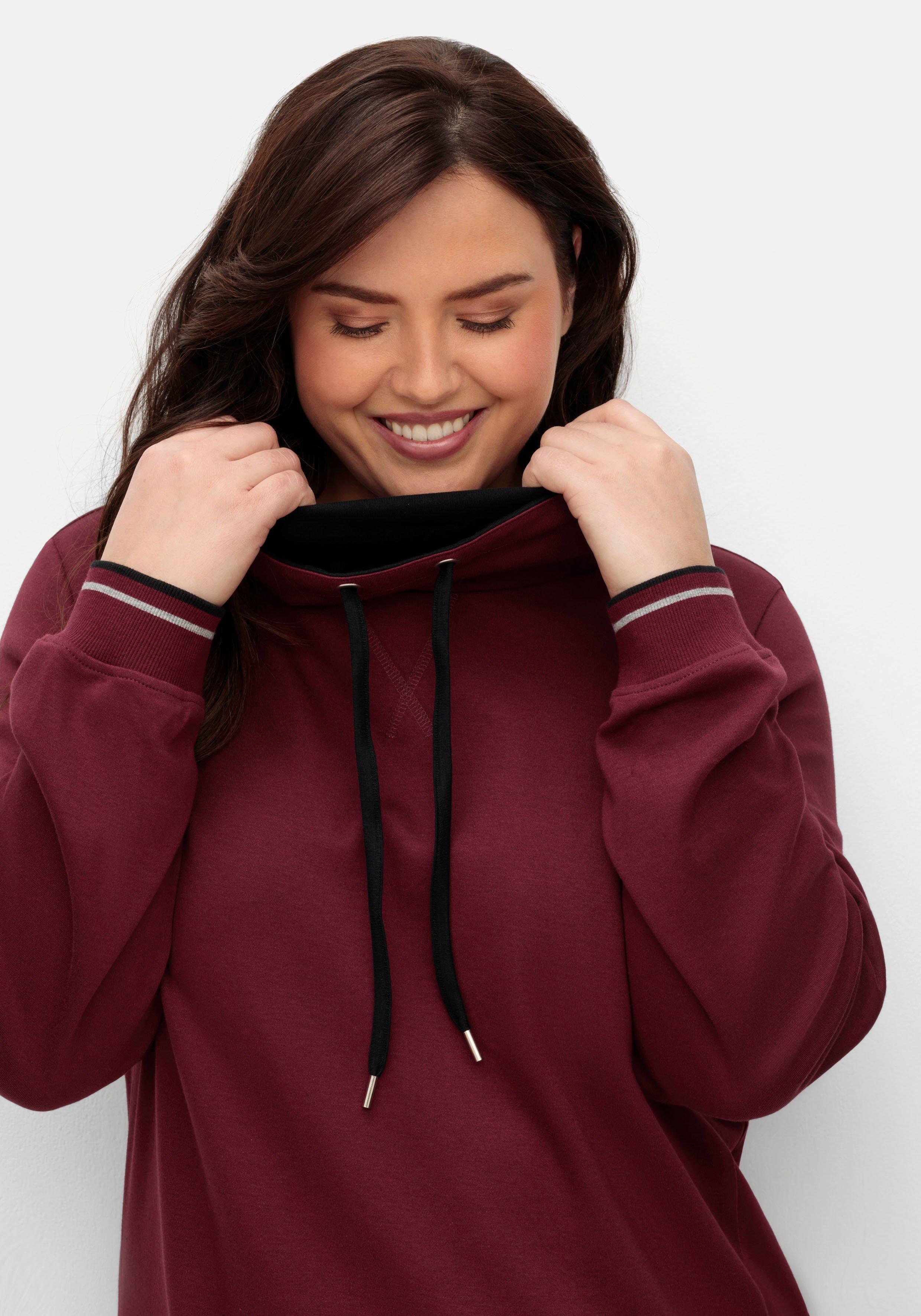 Jerseykleid mit Umlegekragen und Kängurutasche