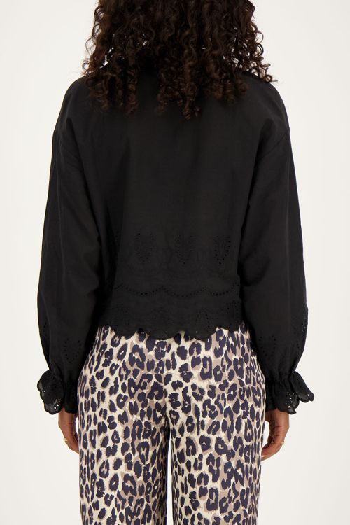 Zwarte blouse met strikjes en broderie