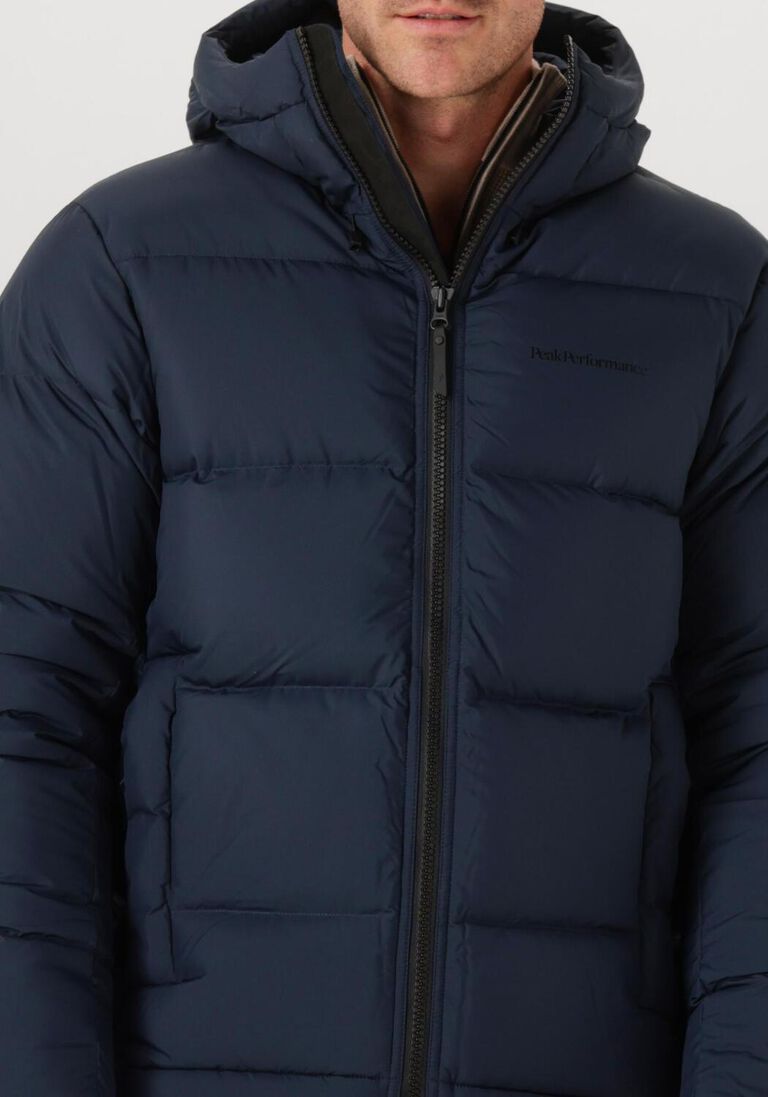 donkerblauwe peak performance gewatteerde jas m rivel down jacket