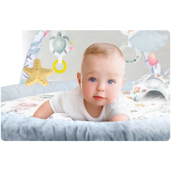 Interaktiv Babymatte Ocean⭐⭐⭐⭐⭐ for design og komfortHOVEDFUNKSJONER:- 7 multifunksjonelle leker- Dedikert pute for magestilling- Rask og enkel å bret