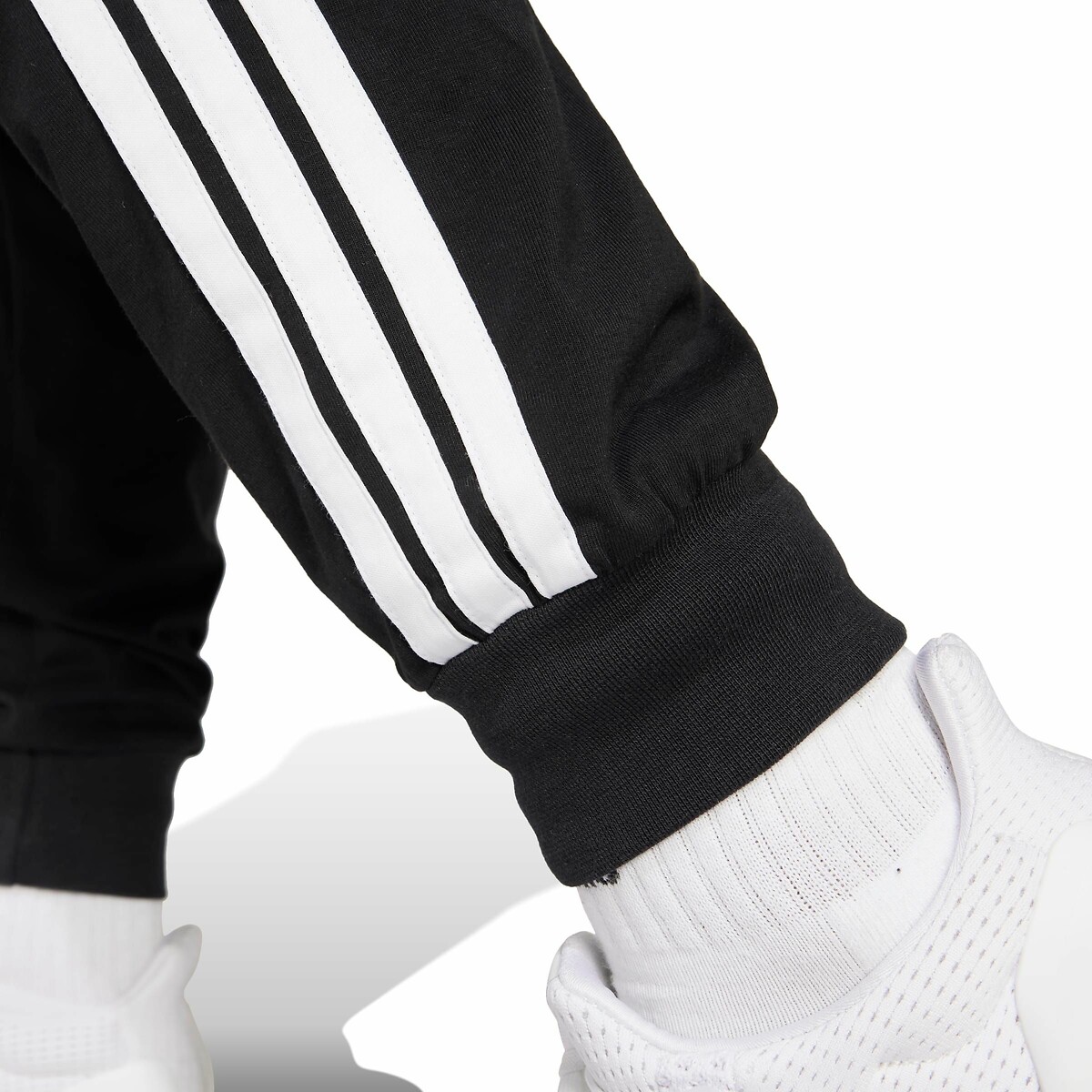 ROUPAS ESPORTIVAS ADIDAS<br>Achatados em fleece Essentials 3 listras