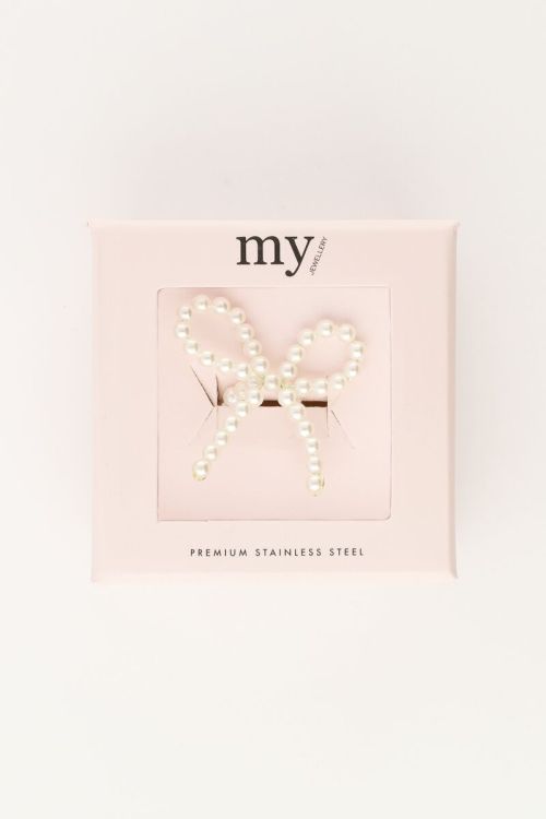 Elastieken ring met parels en strik