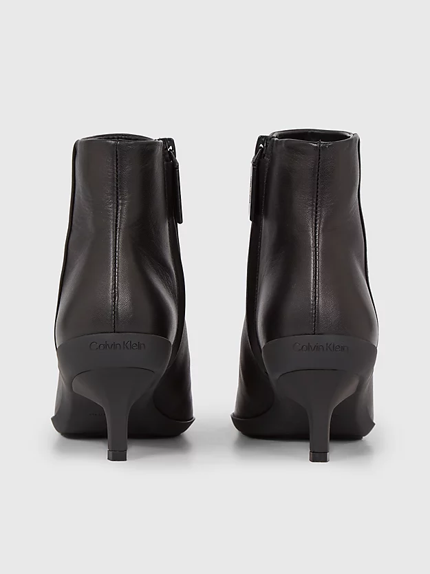 botas de couro até o tornozelo