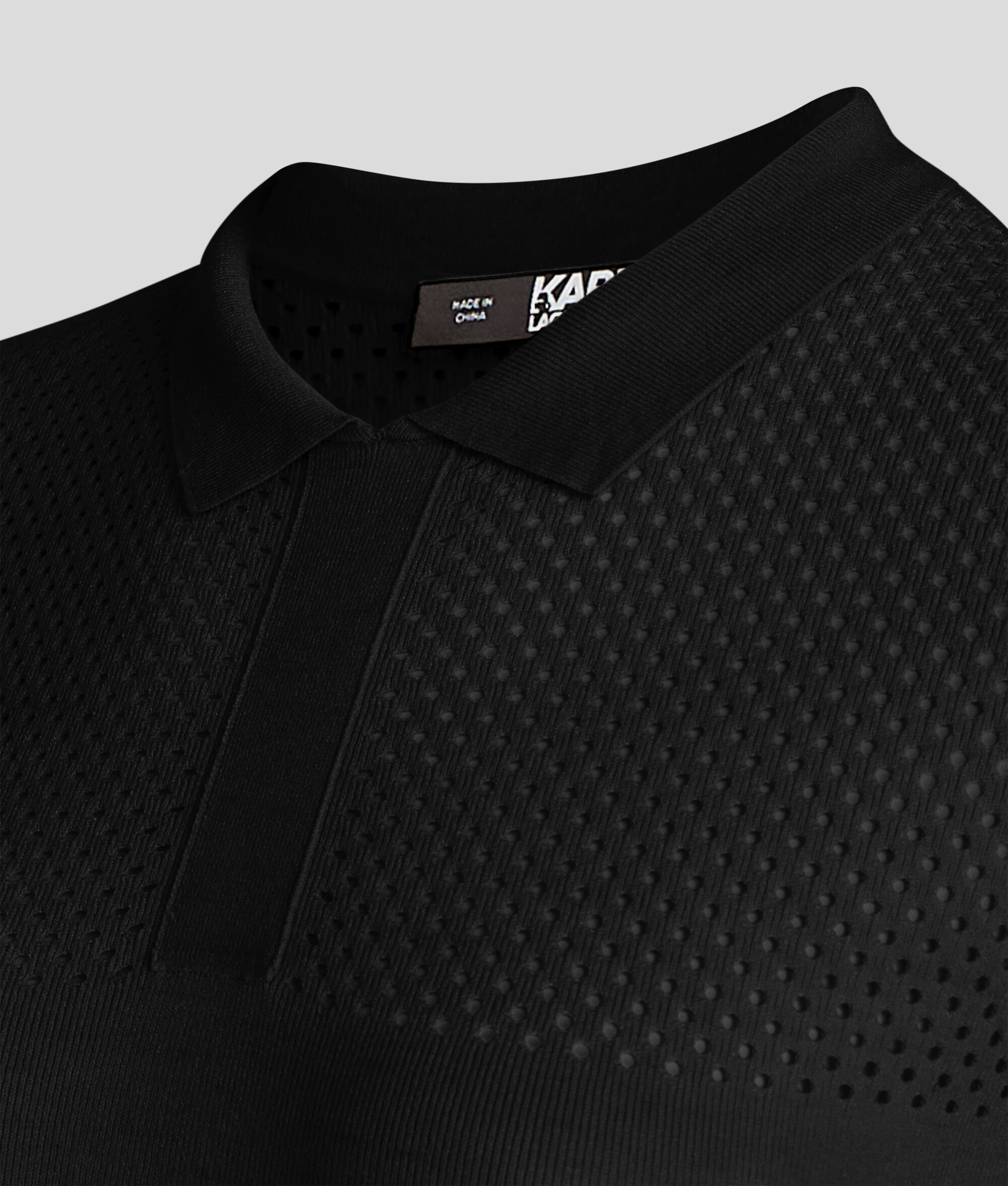 POLO TRICOTÉ EN POINTELLE