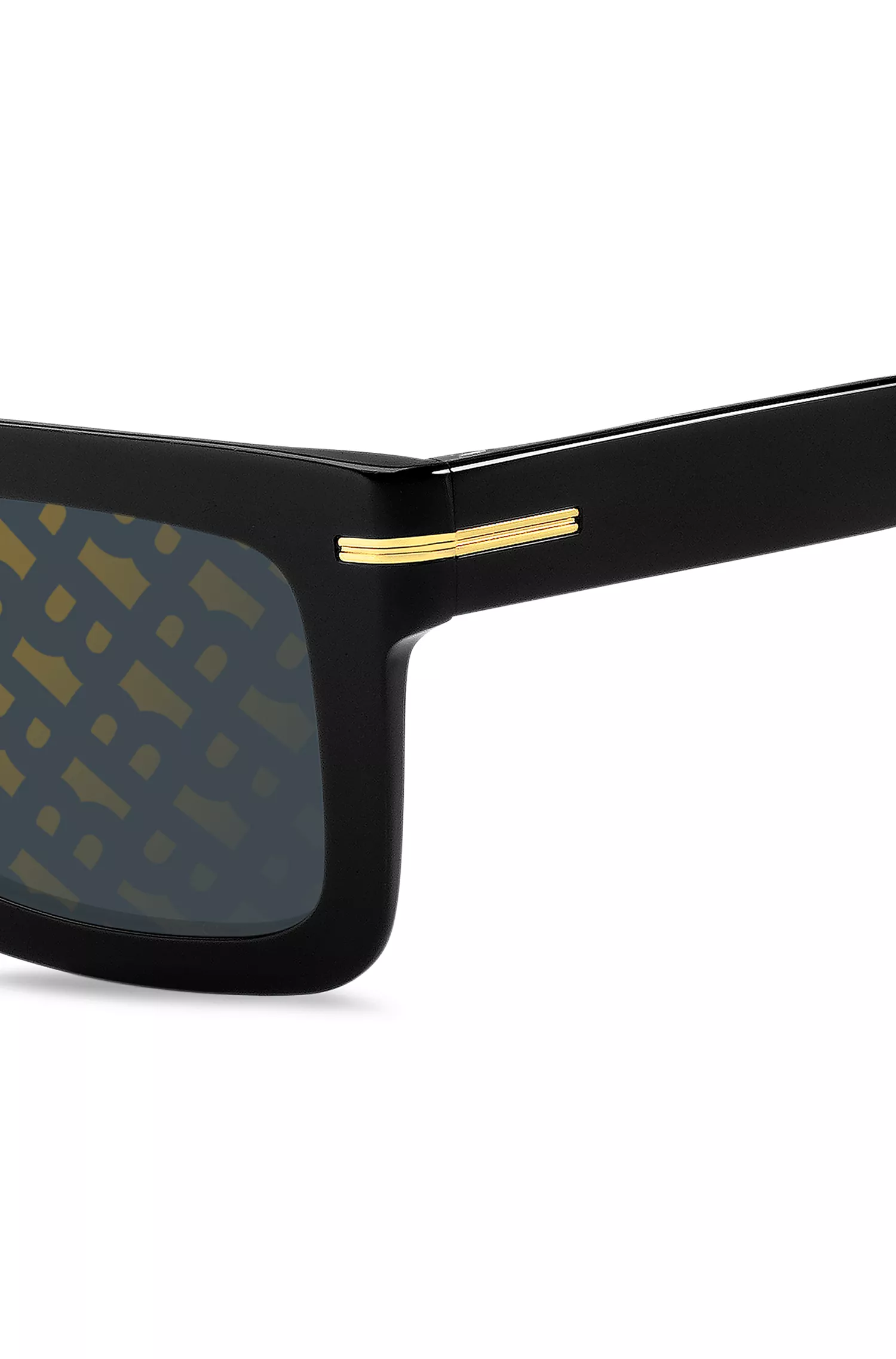 Óculos de sol BOSS em acetato preto com detalhes metálicos exclusivos.