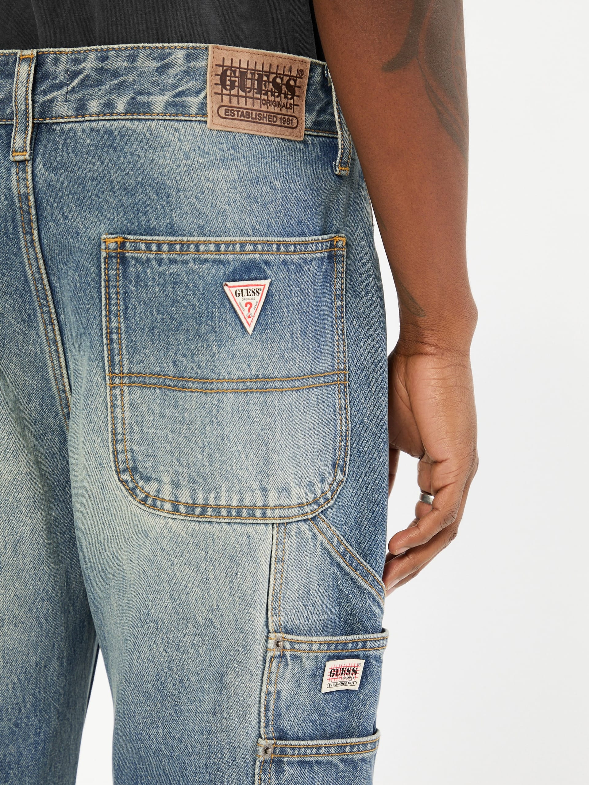 Calça jeans bootcut carpenter da GUESS Originals