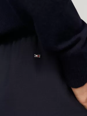 Minissaia justa com cós listrado com o logotipo