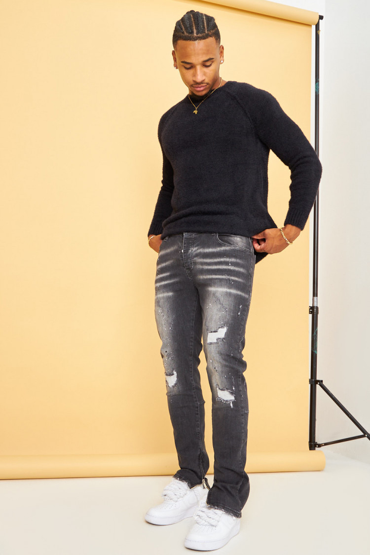 Jeans noir usé avec tâches et déchiré