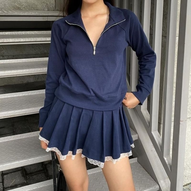 500 STUDIO - Effen pullover met halve rits / mini-plooirok