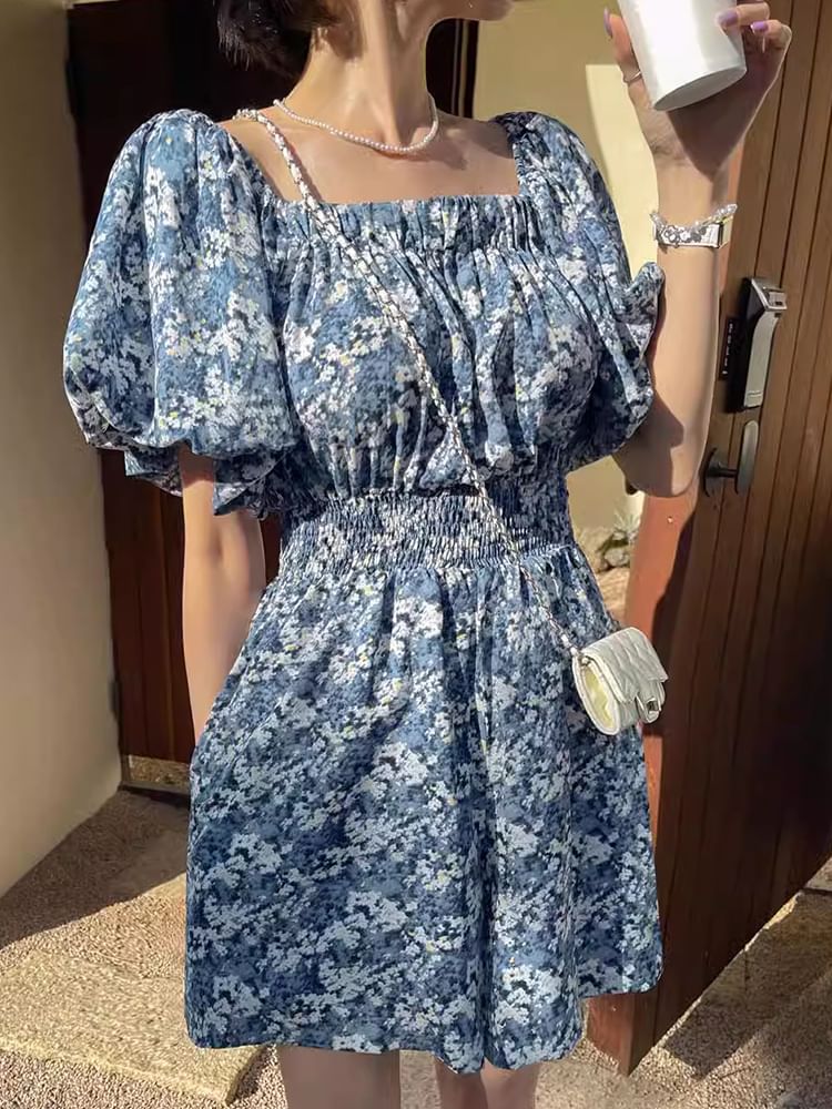 Coris - Romper met korte mouwen, off-shoulder bloemenprint en wijde pijpen