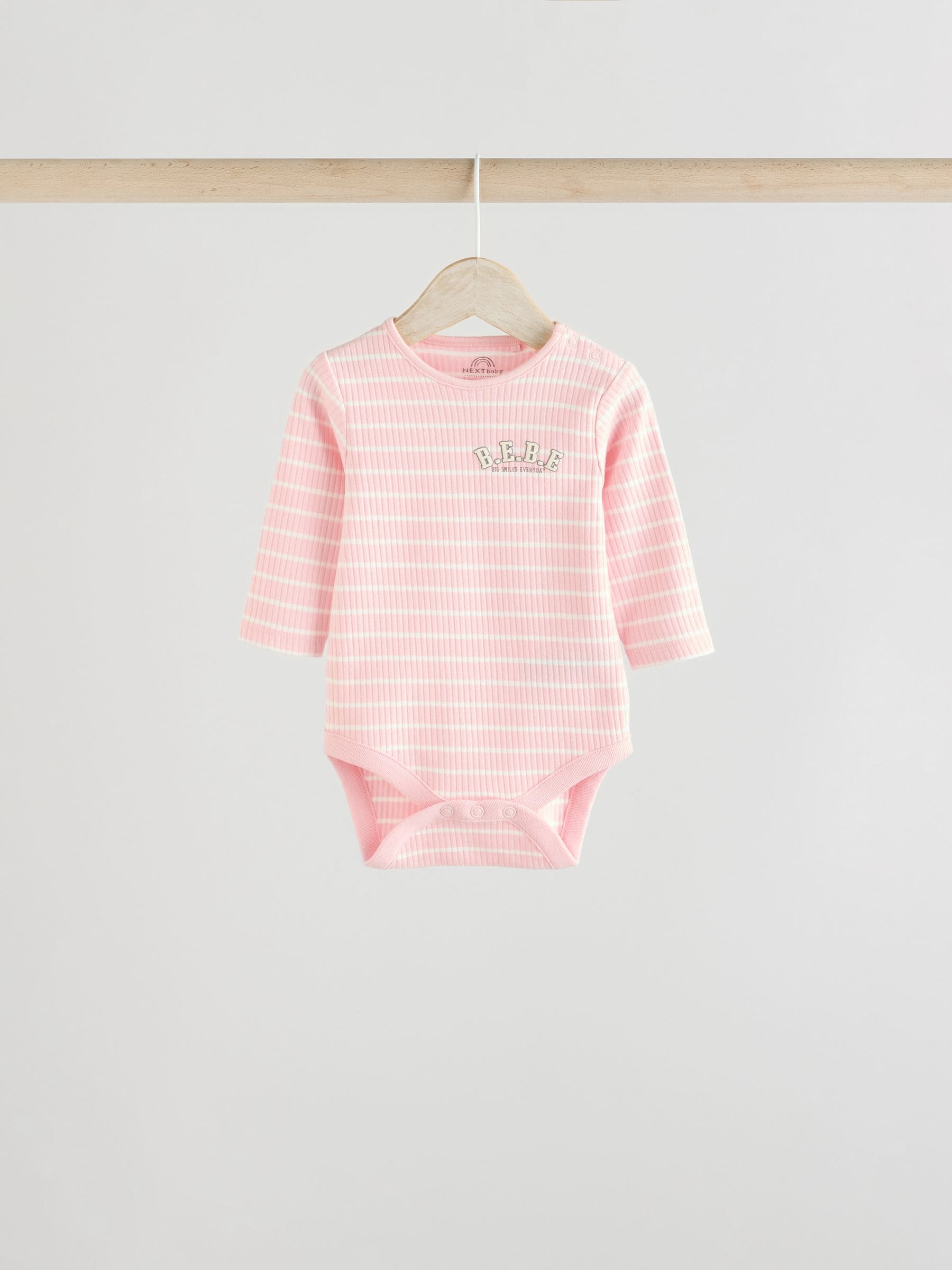 Roze met slogan - Set van 3 babyrompertjes met lange mouwen