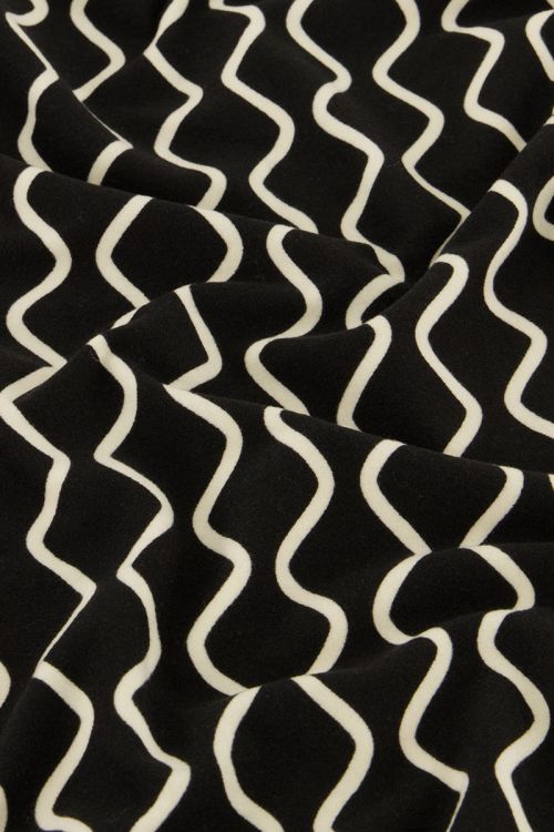 Zwarte top met col en swirl print