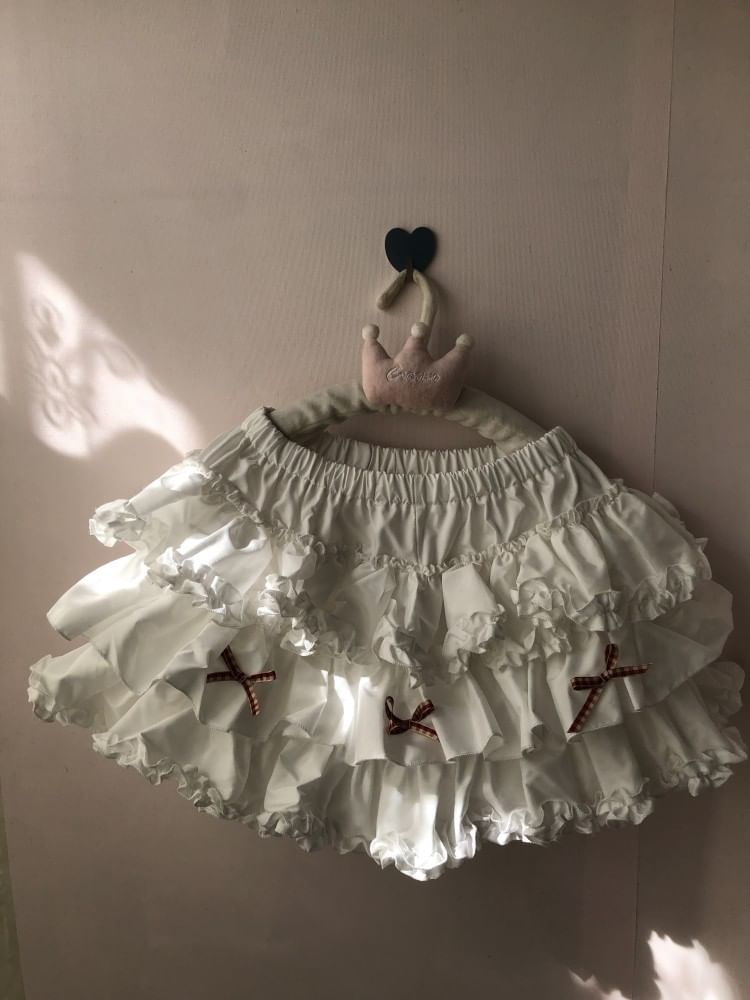 Miu B - Mini A-lijn rok met hoge taille en ruitmotief en strik