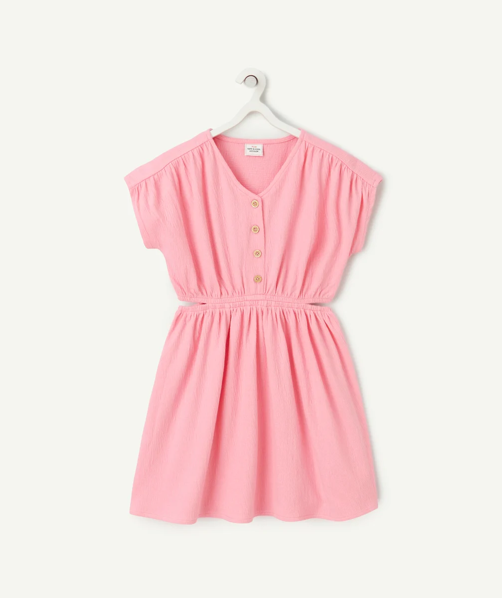 robe fille en matière gaufré rose avec ouvertures cotés