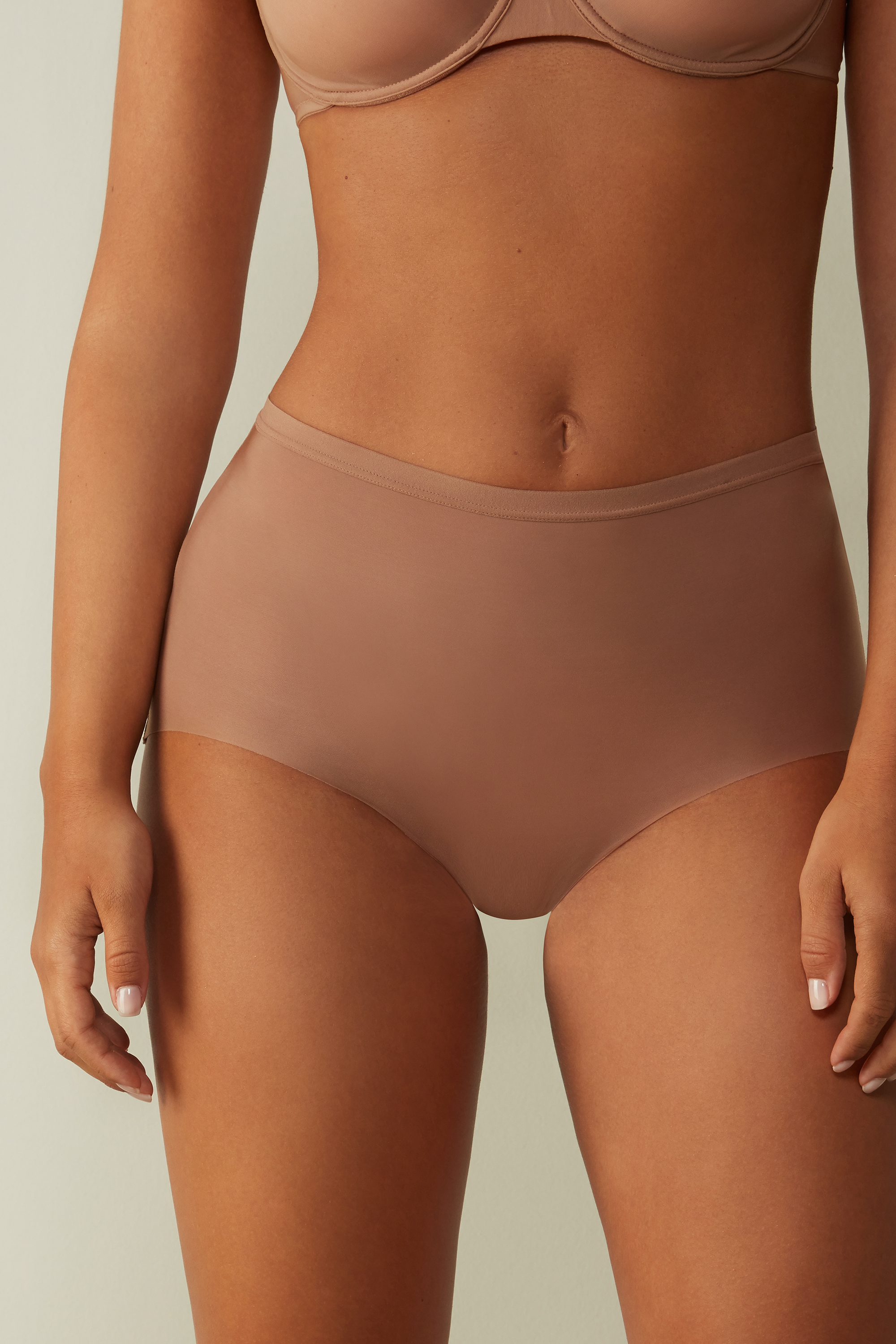 Calça Invisível Touch