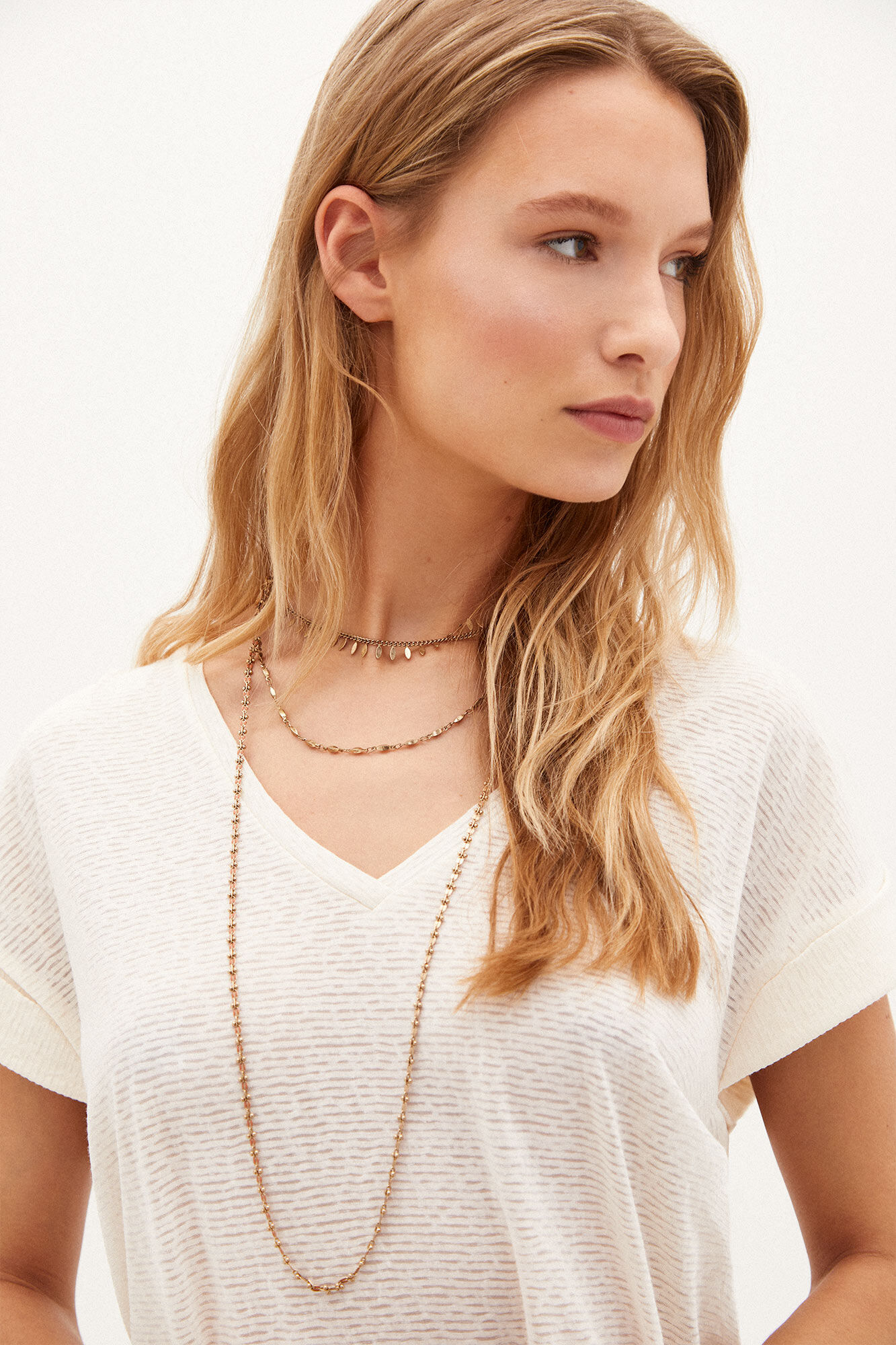 Alessandra. Camiseta listrada - Bege