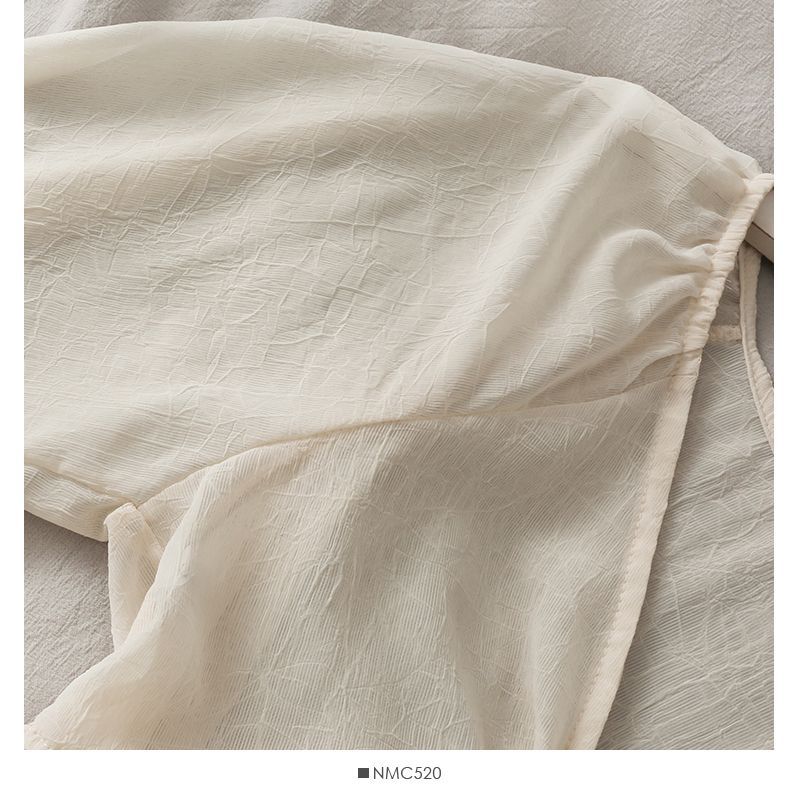 Lemongrass - Chiffon vest met strikceintuur en ballonmouwen