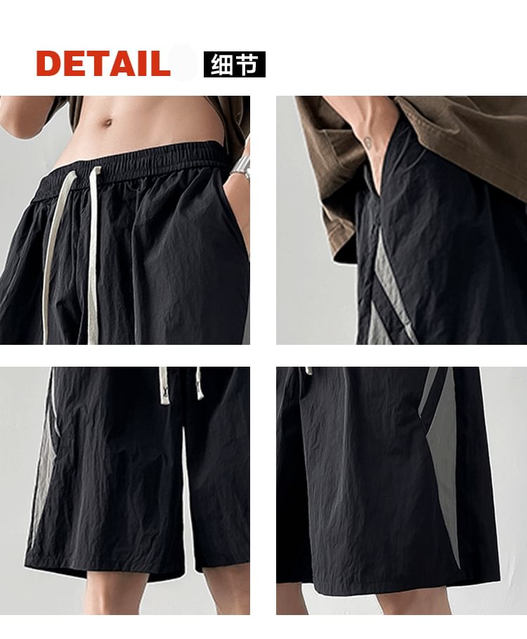 Hushgrain - Tweekleurige shorts met wijde pijpen en trekkoord in de taille