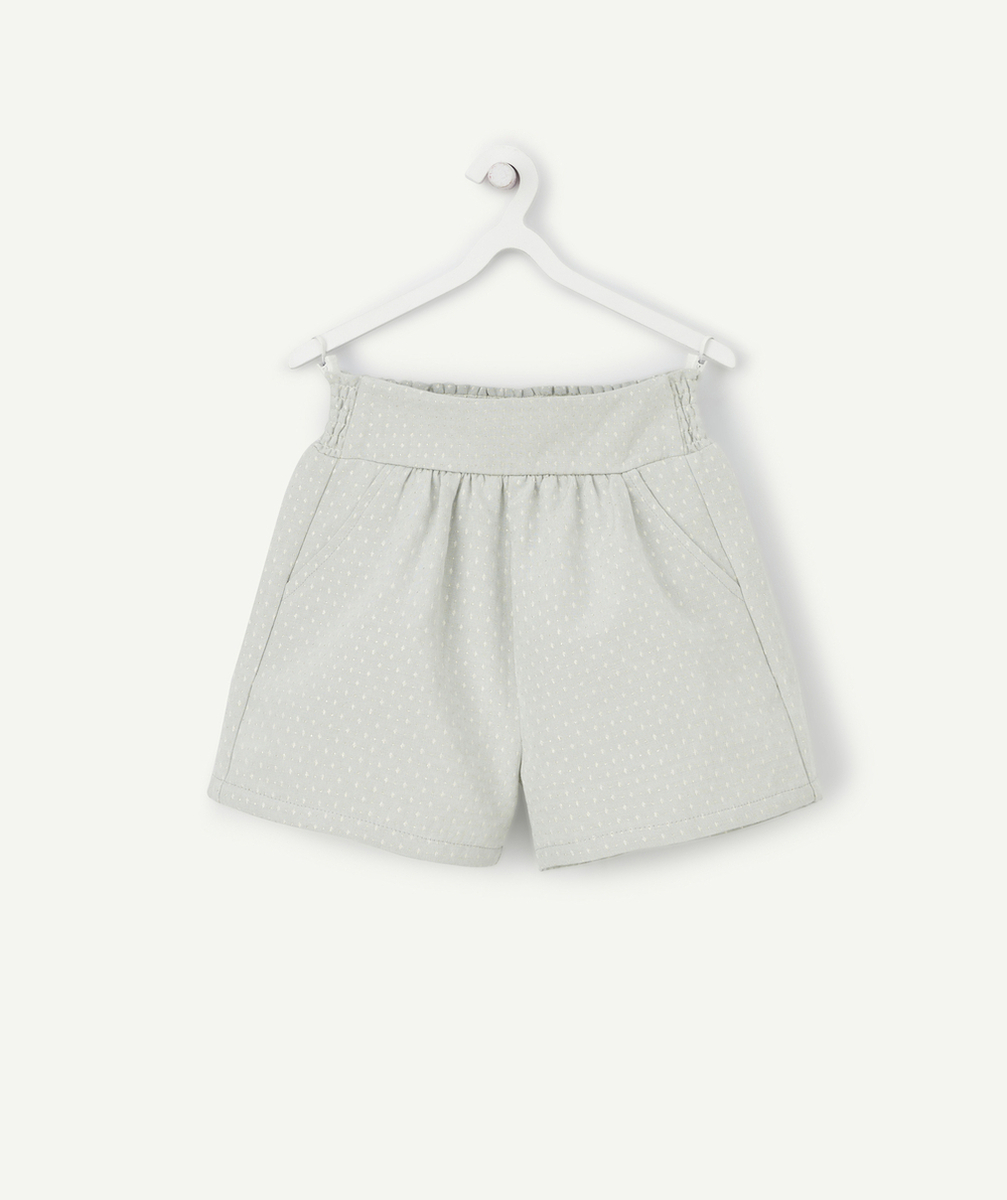 SHORT FILLE VERT AVEC SURPIQÛRES COULEUR DORÉE