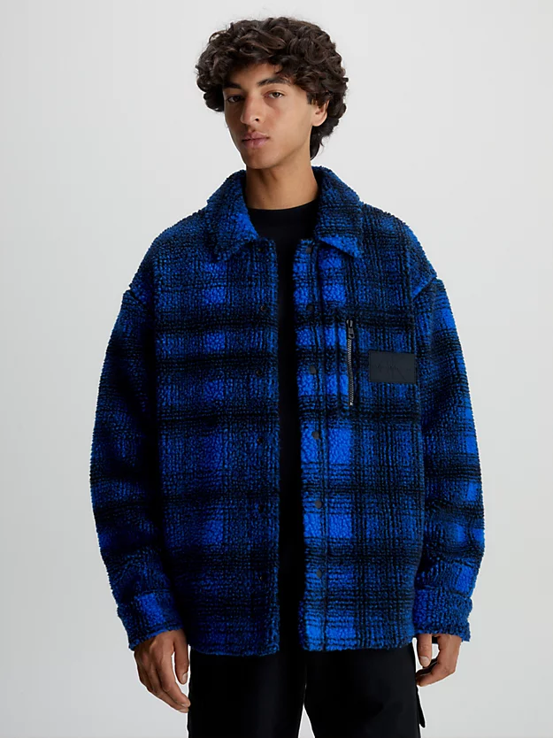 Jaqueta camisa xadrez sherpa