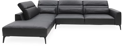 Volanti venstrevendt sofa med pufafslutning