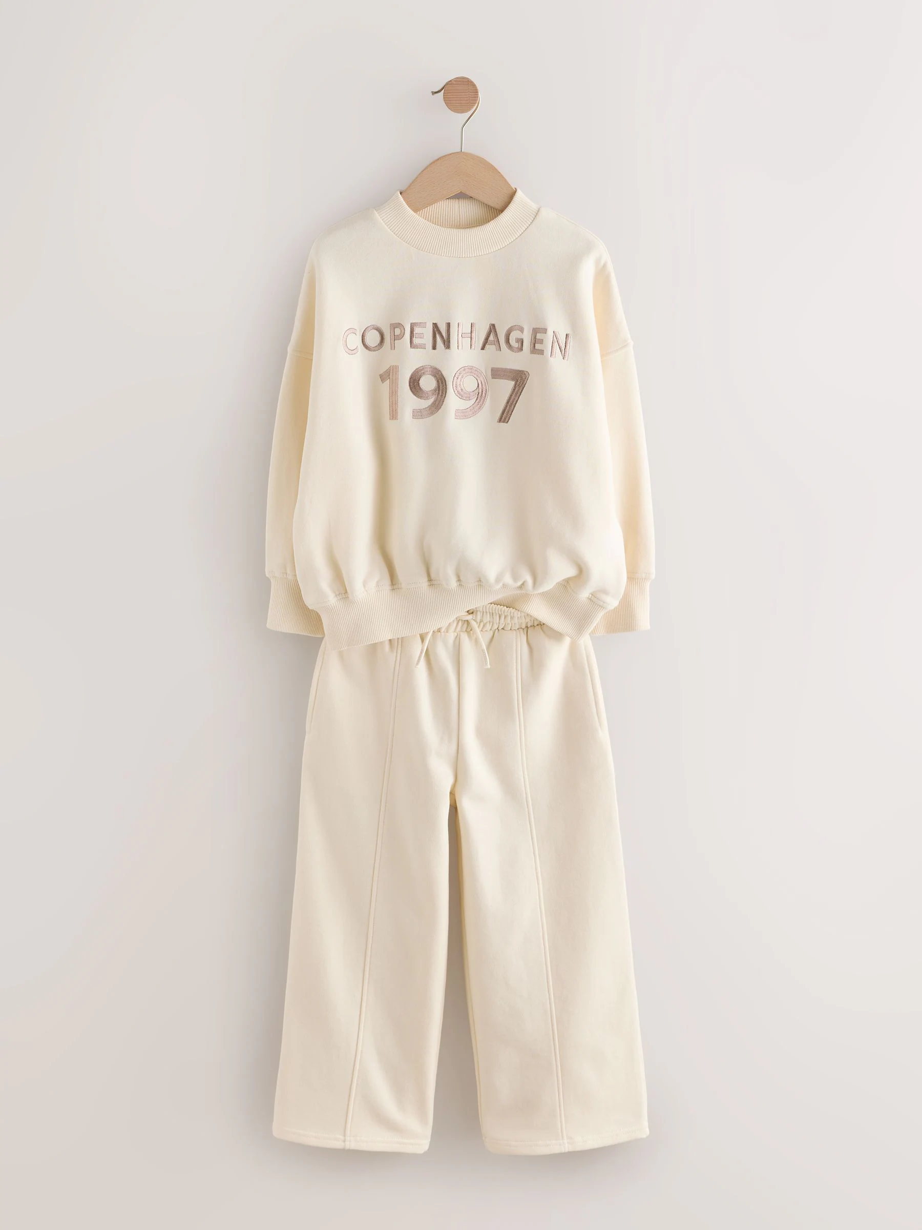 Ecru met slogan - Set van sweatshirt en joggingbroek met wijde pijpen (3-16jr)