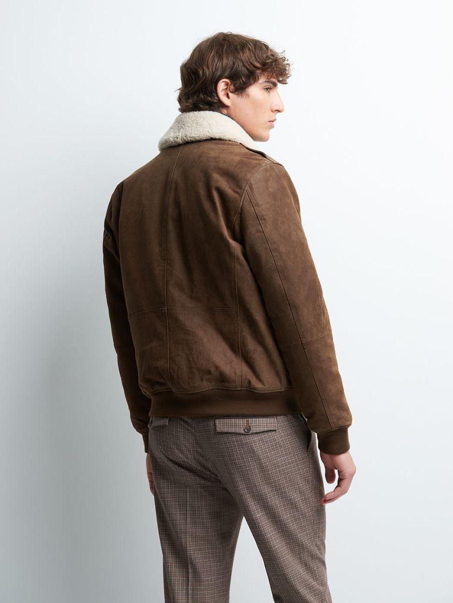 Blouson en cuir col sherpa