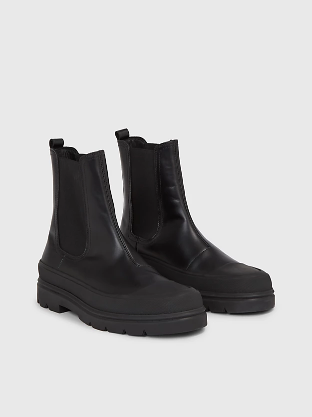 botas de couro até o tornozelo