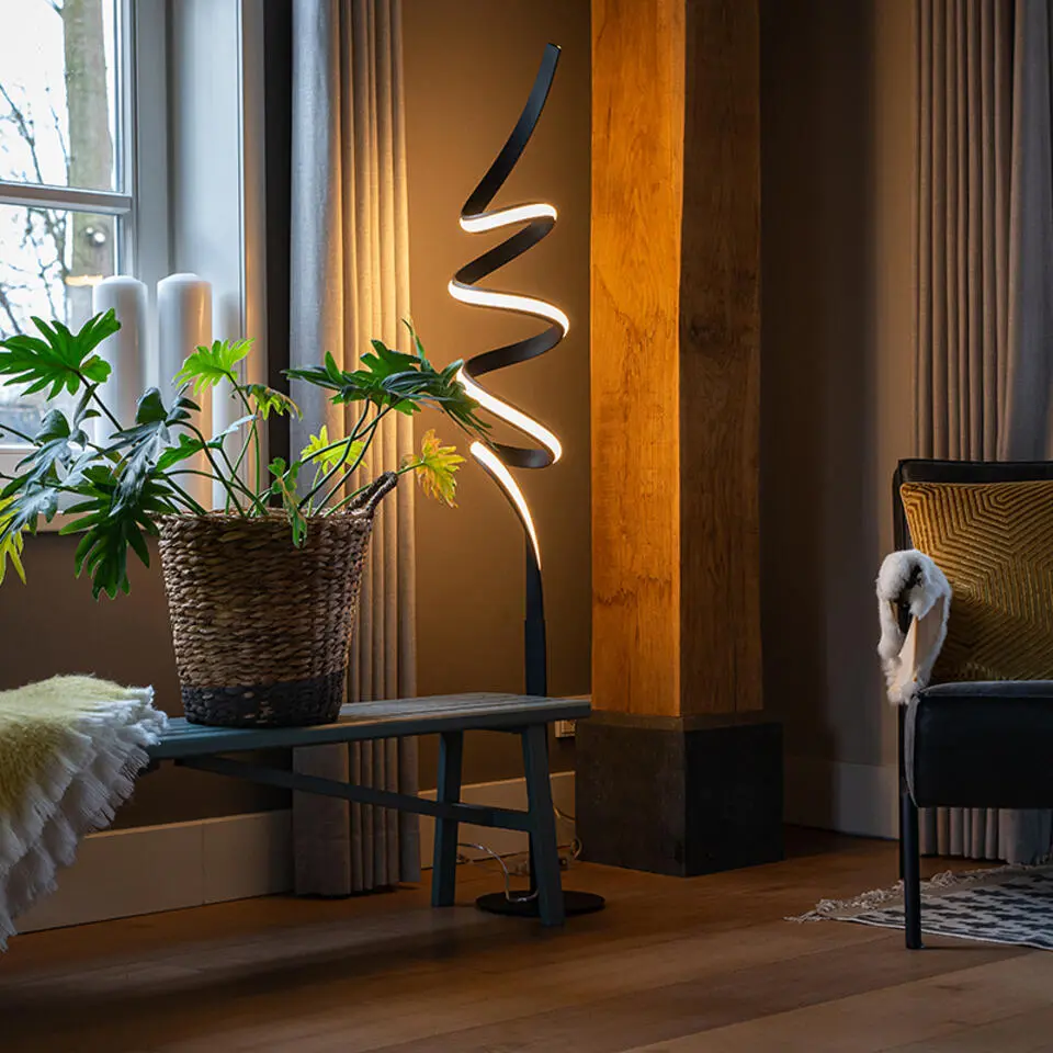 Qazqa vloerlampen twisted fl zwart geïntegreerde led