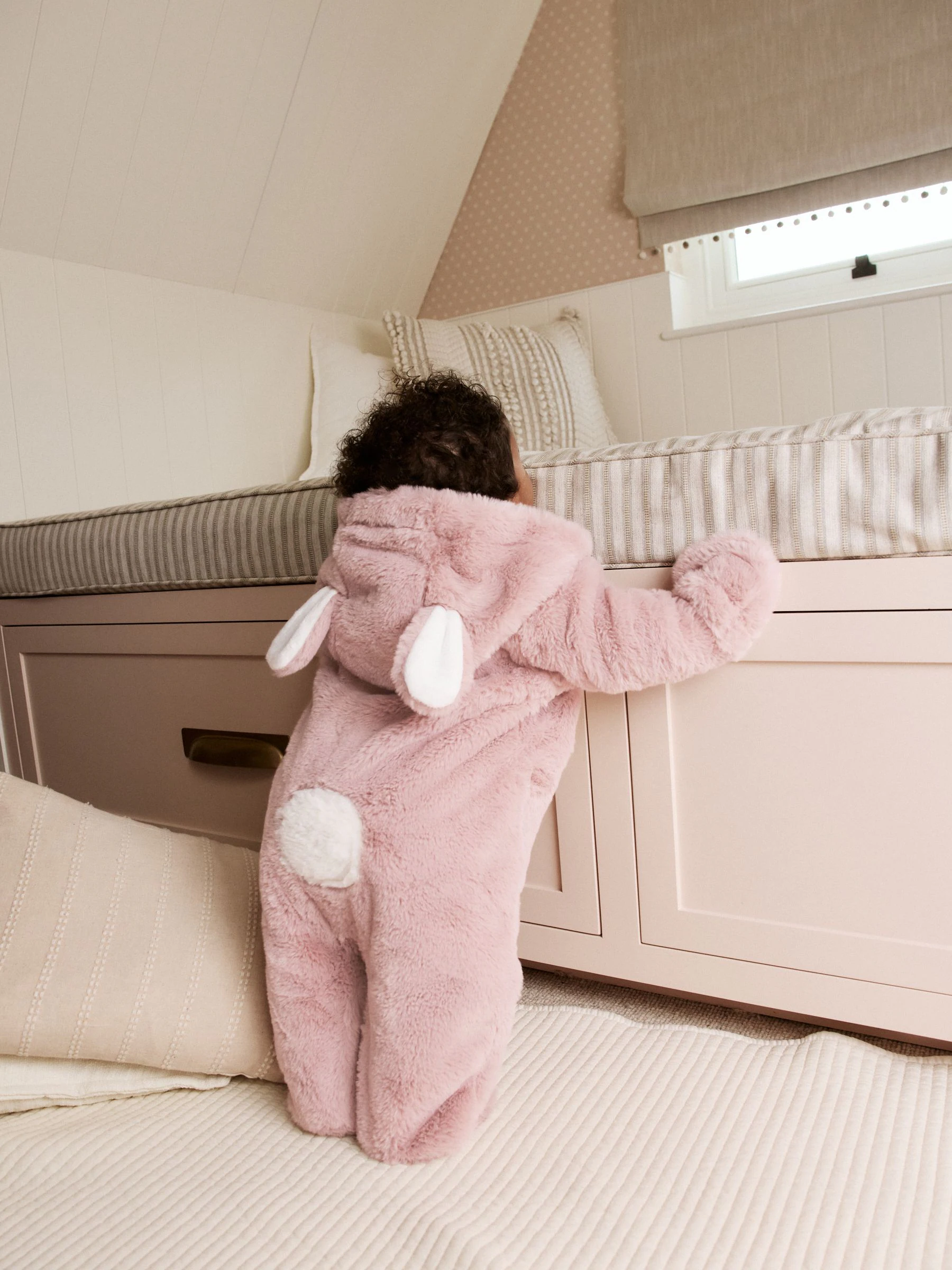 Roze - Baby pakje met konijntjes van imitatiebont (0mnd -2jr)