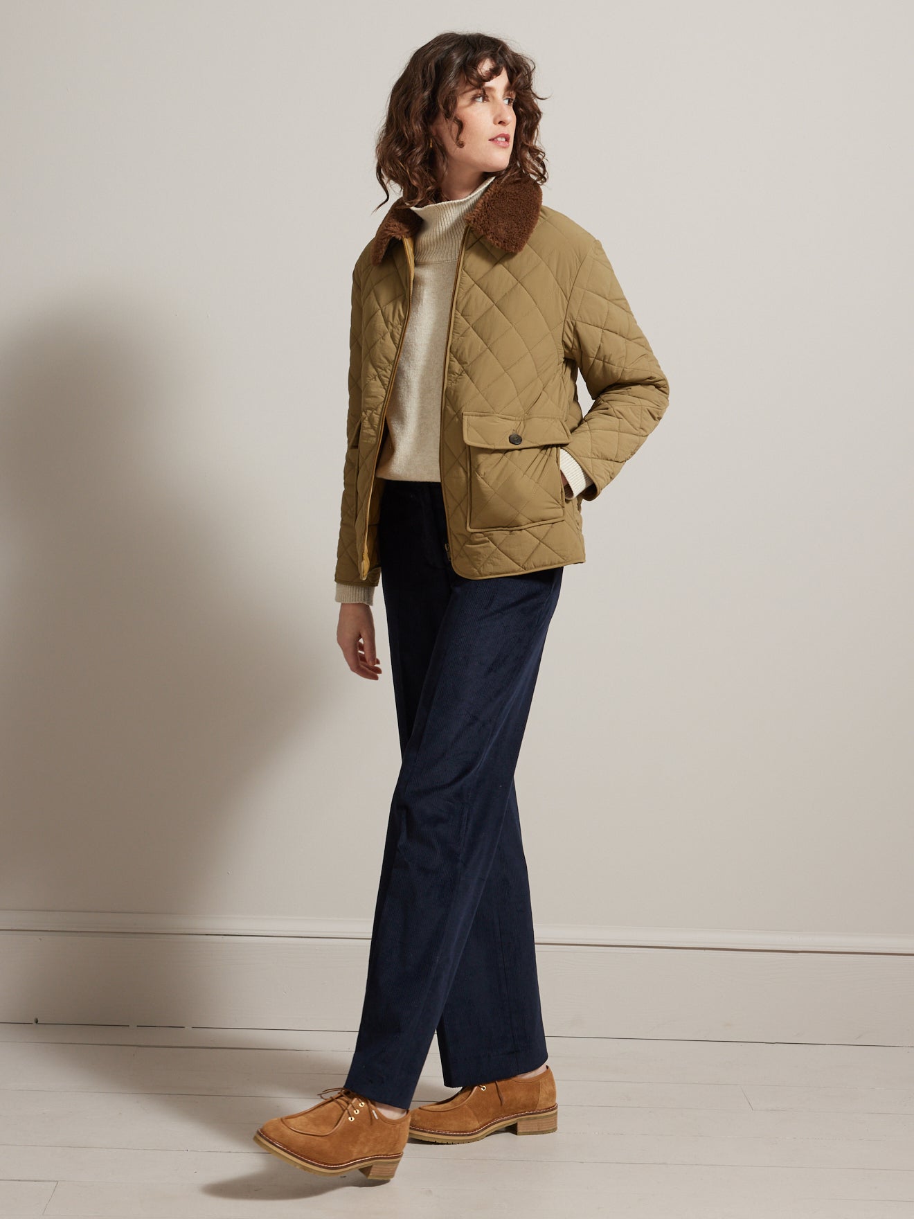 Veste matelassée col fausse fourrure femme