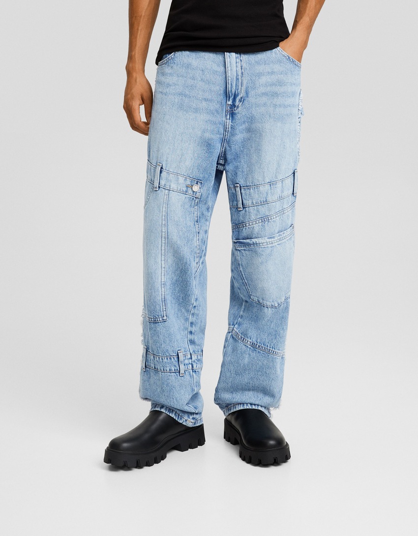 calça jeans larga com apliques