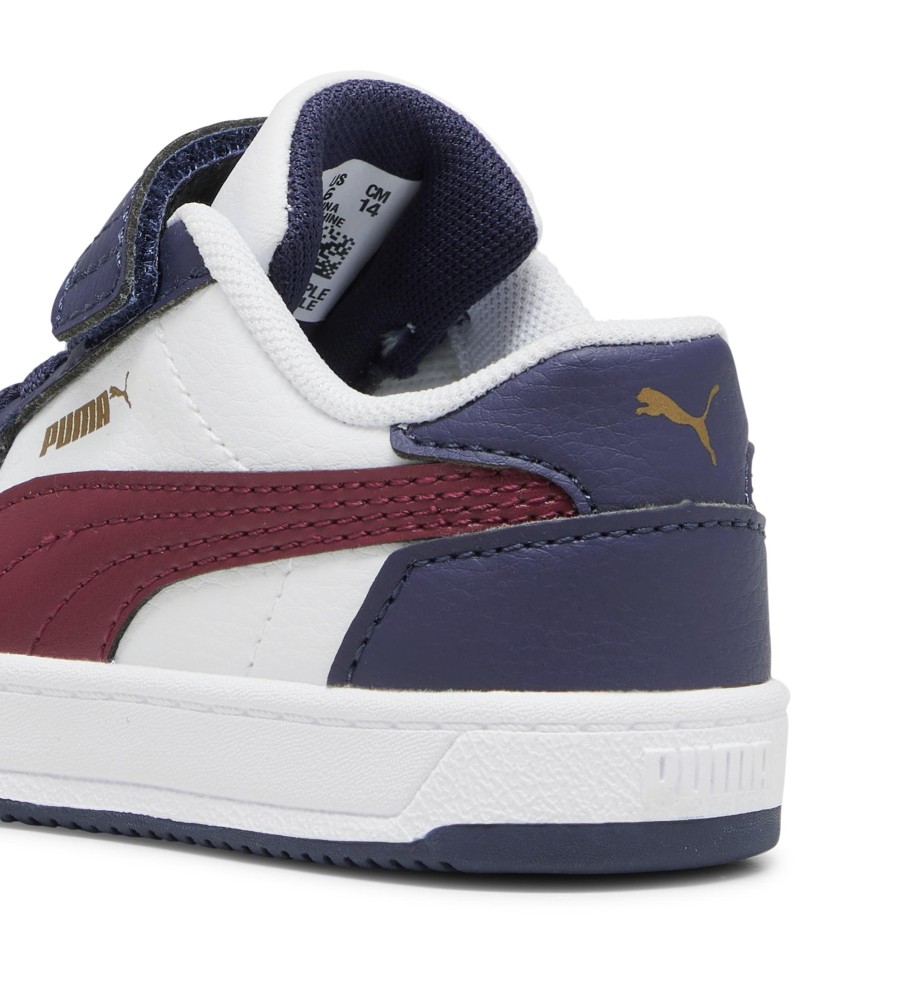 Tênis Puma Caven 2.0, branco e azul marinho.