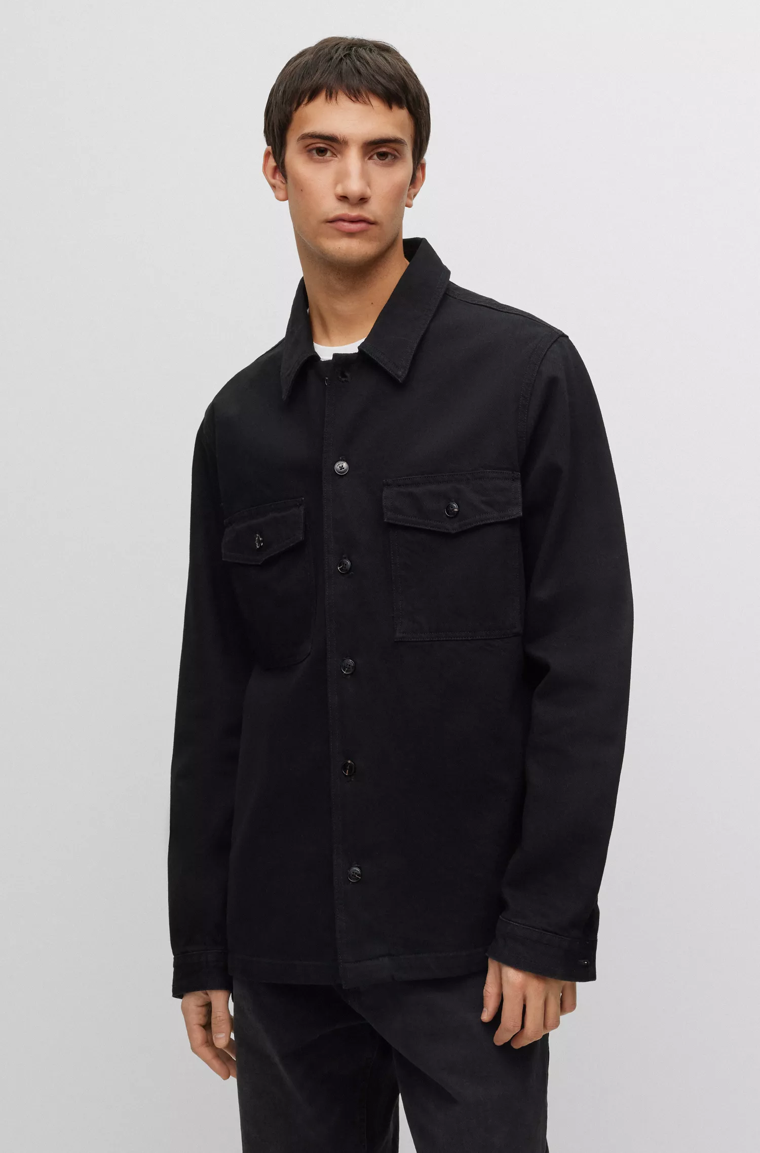Sobretudo HUGO vermelho de modelagem oversized em denim com estampa de rabiscos nas costas.