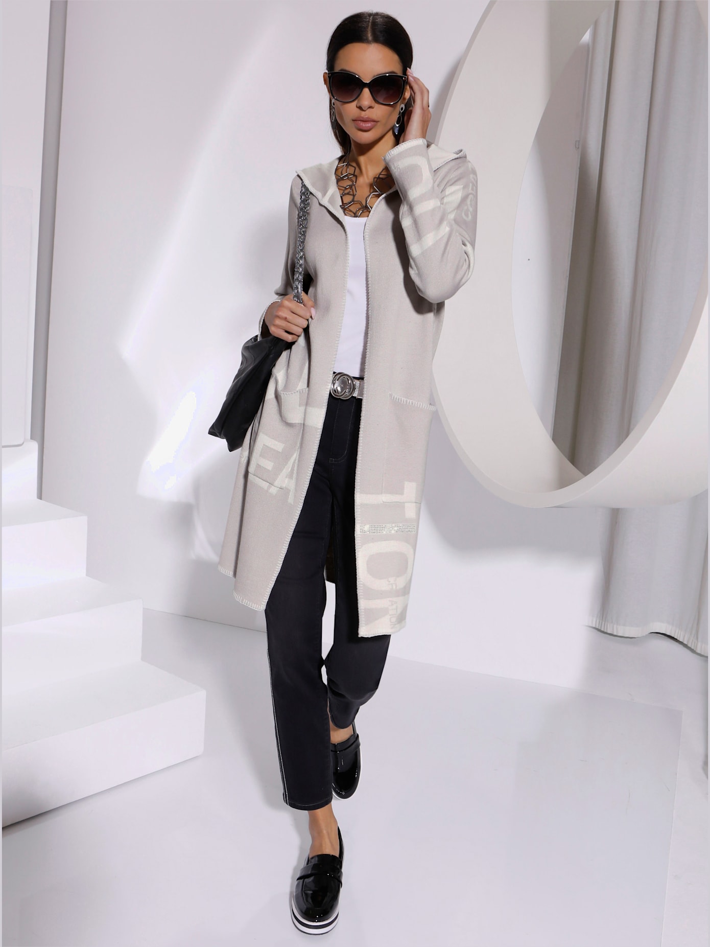 Veste en tricot forme ouverte et longue tendance